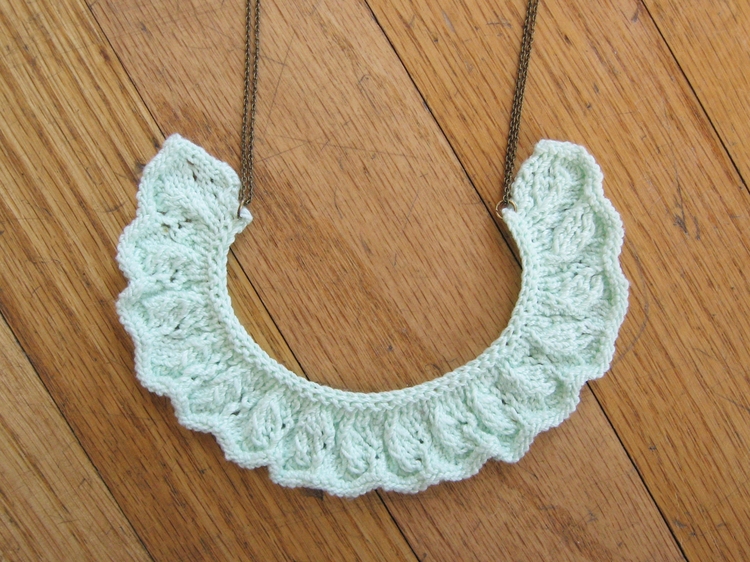 Curved, ruched, knitted lace is perfect for a necklace.
