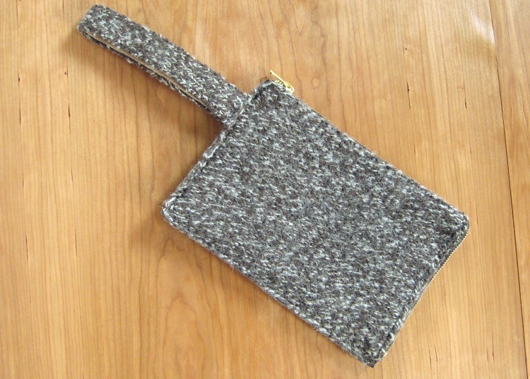 leather and wool clutch